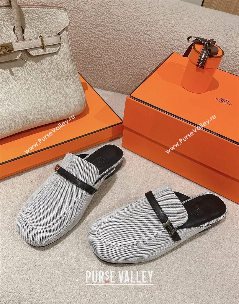 Hermes Groupie mules in H canvas and calfskin with miniature permabrass-plated Paris buckle (modeng-24011604)