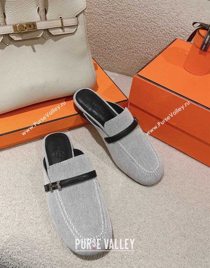 Hermes Groupie mules in H canvas and calfskin with miniature permabrass-plated Paris buckle (modeng-24011604)