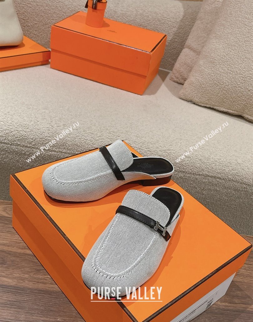 Hermes Groupie mules in H canvas and calfskin with miniature permabrass-plated Paris buckle (modeng-24011604)