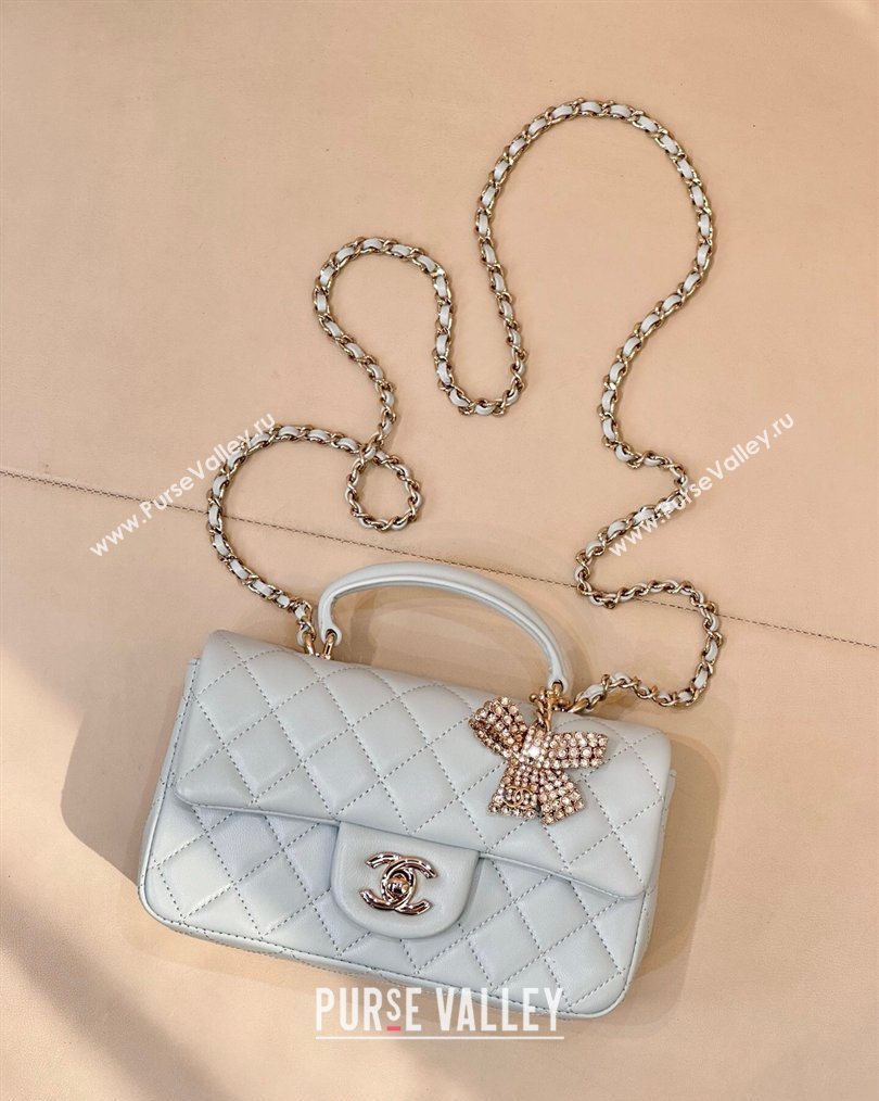 Chanel Lambskin Leather Mini Classic Flap Handbag With Top Handle and Bow Charm Light Blue 2026 AS2431 (yezi-260204042)