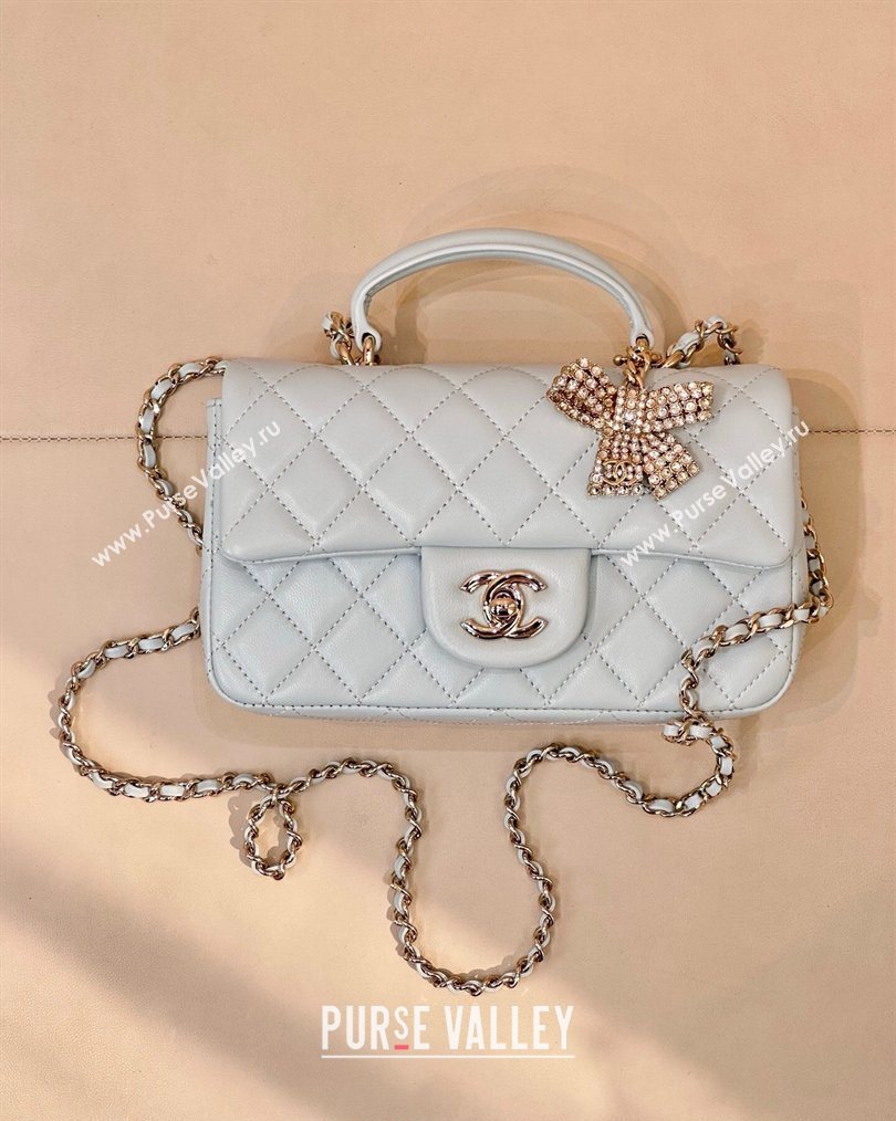 Chanel Lambskin Leather Mini Classic Flap Handbag With Top Handle and Bow Charm Light Blue 2026 AS2431 (yezi-260204042)