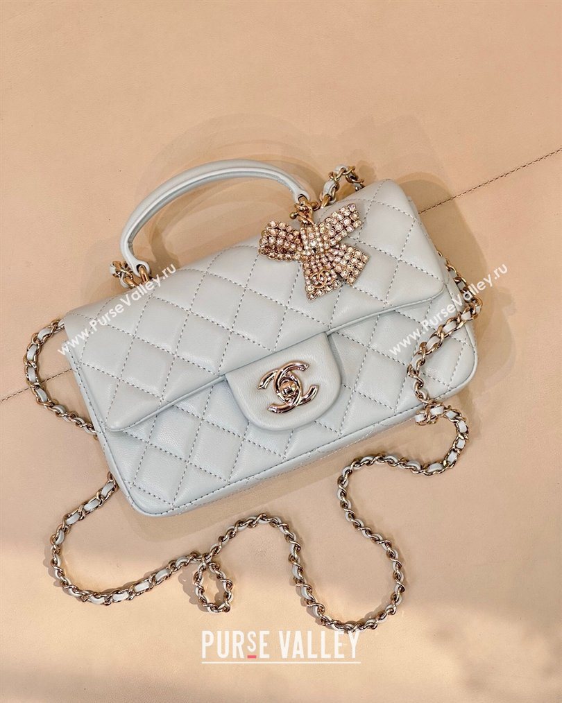 Chanel Lambskin Leather Mini Classic Flap Handbag With Top Handle and Bow Charm Light Blue 2026 AS2431 (yezi-260204042)