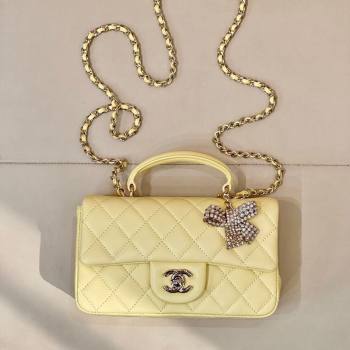 Chanel Lambskin Leather Mini Classic Flap Handbag With Top Handle and Bow Charm Yellow 2026 AS2431 (yezi-260204044)