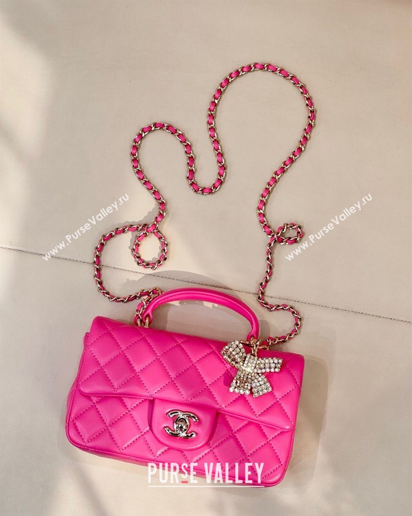 Chanel Lambskin Leather Mini Classic Flap Handbag With Top Handle and Bow Charm Fuchsia 2026 AS2431 (yezi-260204035)