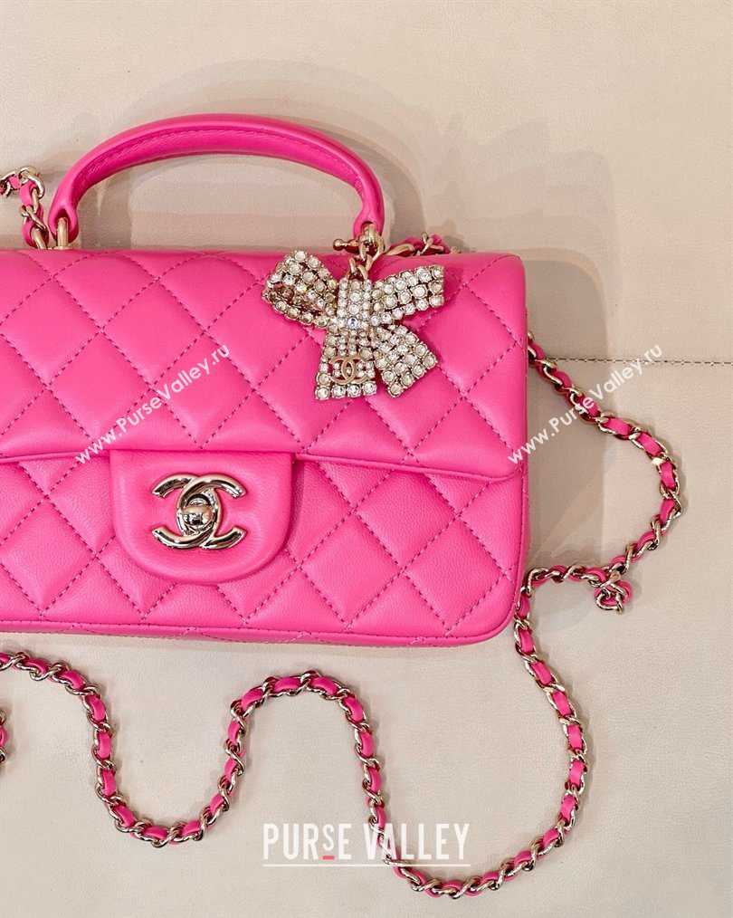 Chanel Lambskin Leather Mini Classic Flap Handbag With Top Handle and Bow Charm Fuchsia 2026 AS2431 (yezi-260204035)
