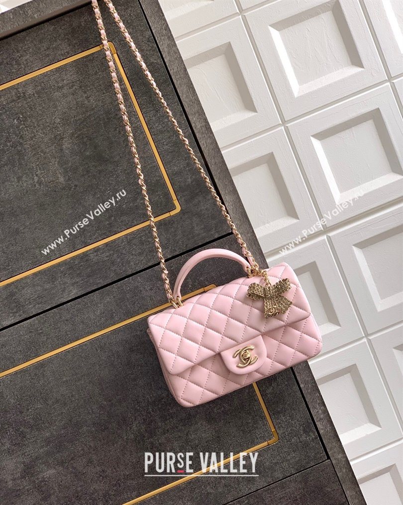 Chanel Lambskin Leather Mini Classic Flap Handbag With Top Handle and Bow Charm Light Pink 2026 AS2431 (yezi-260204028)