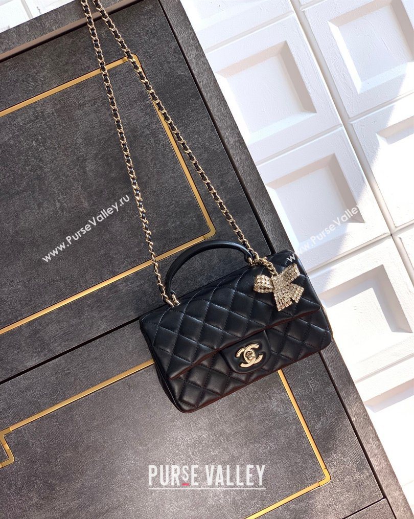 Chanel Lambskin Leather Mini Classic Flap Handbag With Top Handle and Bow Charm Black/Gold 2026 AS2431 (yezi-260204034)