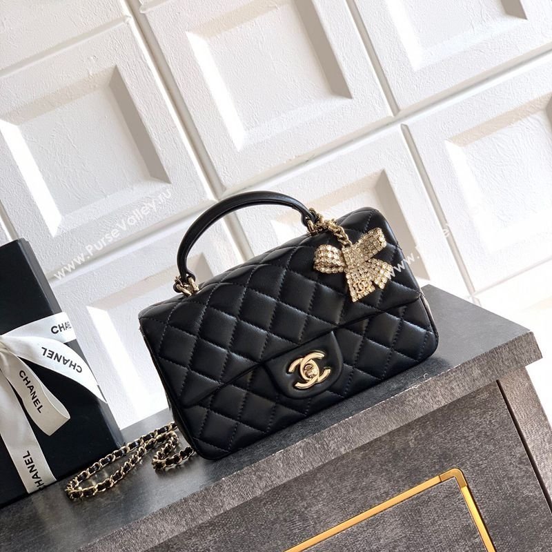 Chanel Lambskin Leather Mini Classic Flap Handbag With Top Handle and Bow Charm Black/Gold 2026 AS2431 (yezi-260204034)