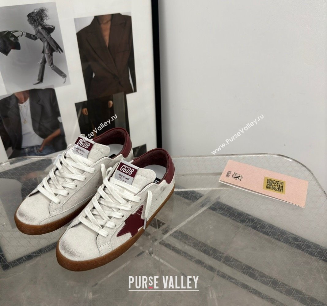 Golden Goose Super-Star Sneakers in white leather with burgundy leather star and heel tab 2024 (13-241009052)