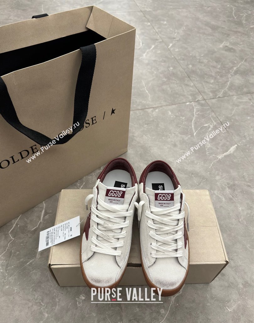 Golden Goose Super-Star Sneakers in white leather with burgundy leather star and heel tab 2024 (13-241009052)