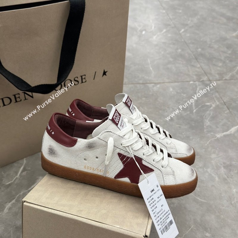 Golden Goose Super-Star Sneakers in white leather with burgundy leather star and heel tab 2024 (13-241009052)