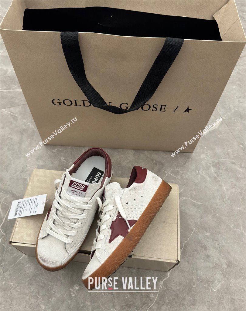 Golden Goose Super-Star Sneakers in white leather with burgundy leather star and heel tab 2024 (13-241009052)