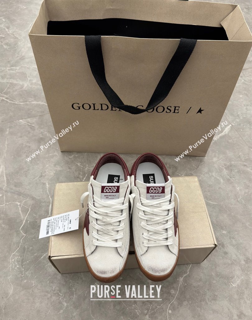 Golden Goose Super-Star Sneakers in white leather with burgundy leather star and heel tab 2024 (13-241009052)