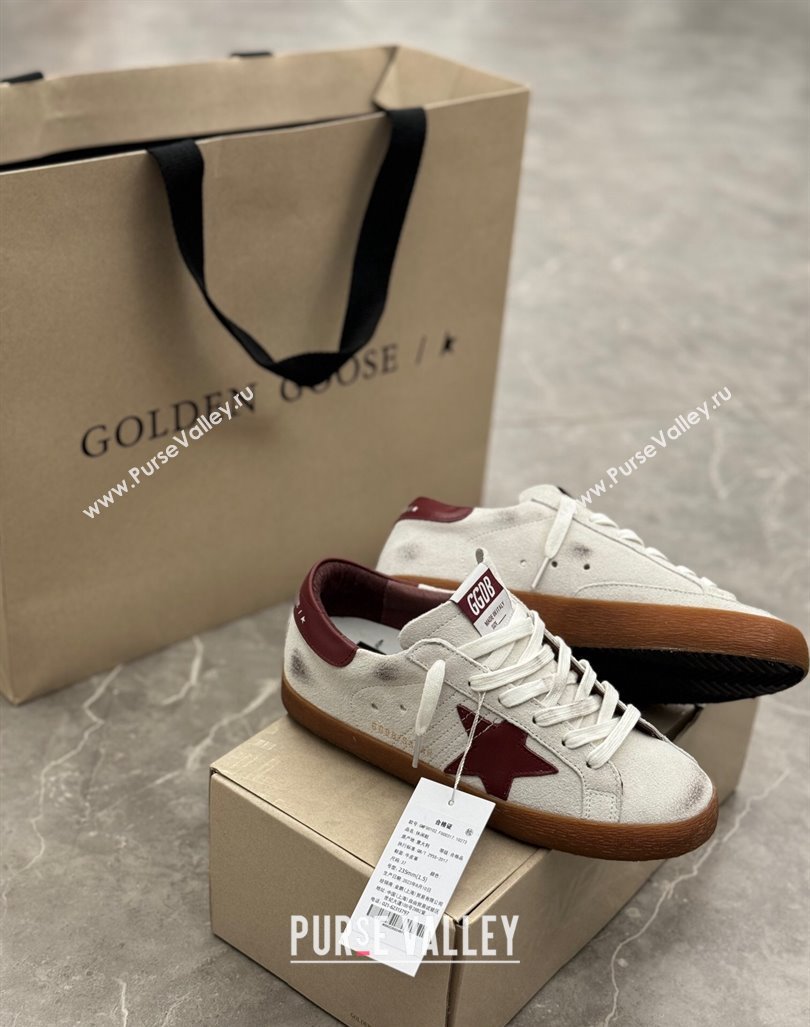 Golden Goose Super-Star Sneakers in white leather with burgundy leather star and heel tab 2024 (13-241009052)