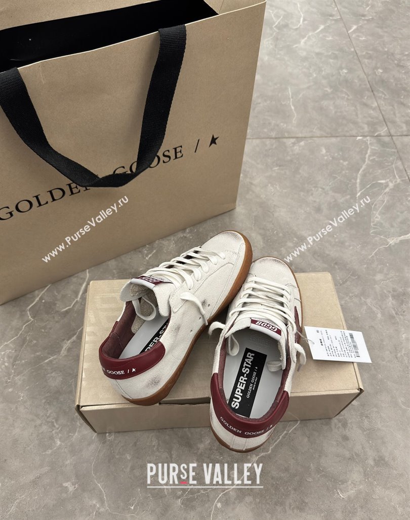 Golden Goose Super-Star Sneakers in white leather with burgundy leather star and heel tab 2024 (13-241009052)