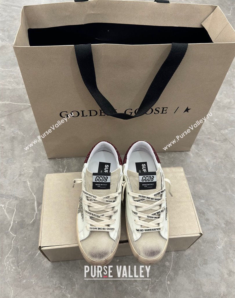 Golden Goose Super-Star Sneakers in white leather with silver glitter star and burgundy heel 2024 (13-241009057)