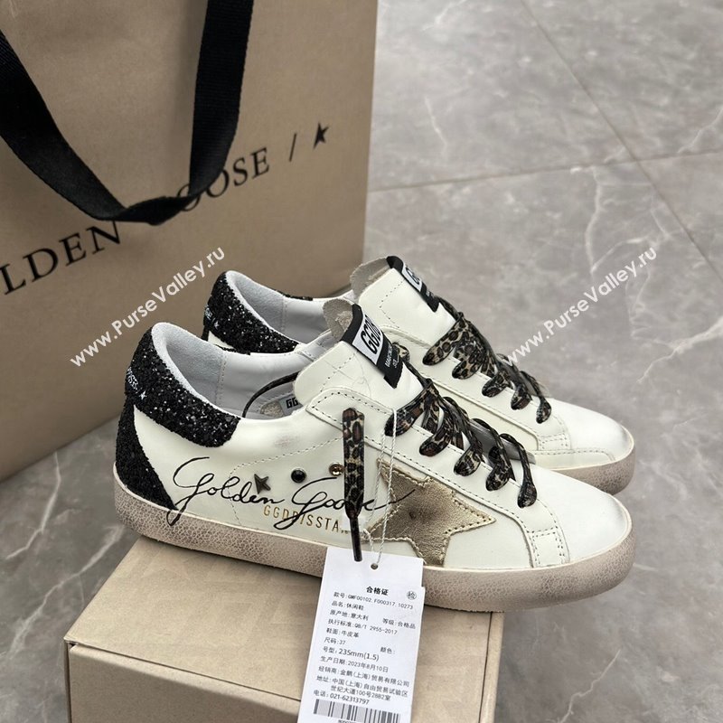 Golden Goose Super-Star Sneakers in white leather with black strass tab and gold star 2024 (13-241113003)