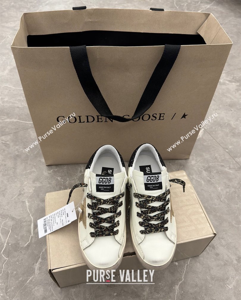 Golden Goose Super-Star Sneakers in white leather with black strass tab and gold star 2024 (13-241113003)