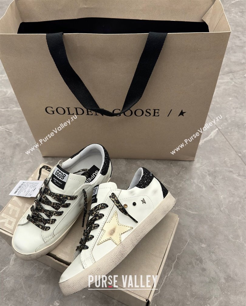 Golden Goose Super-Star Sneakers in white leather with black strass tab and gold star 2024 (13-241113003)