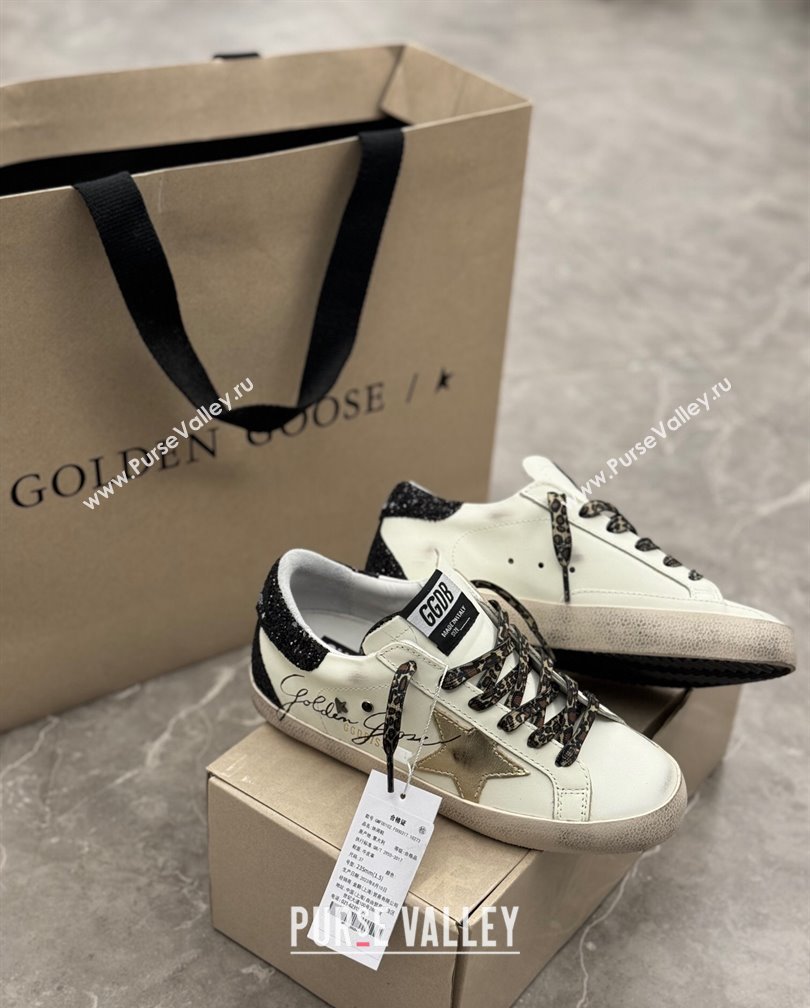 Golden Goose Super-Star Sneakers in white leather with black strass tab and gold star 2024 (13-241113003)