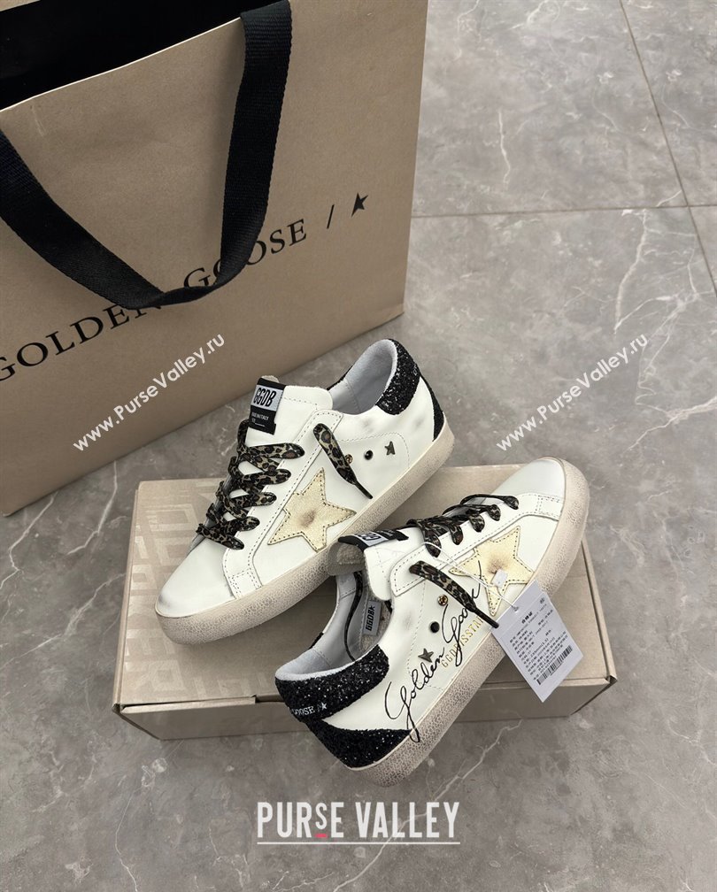 Golden Goose Super-Star Sneakers in white leather with black strass tab and gold star 2024 (13-241113003)