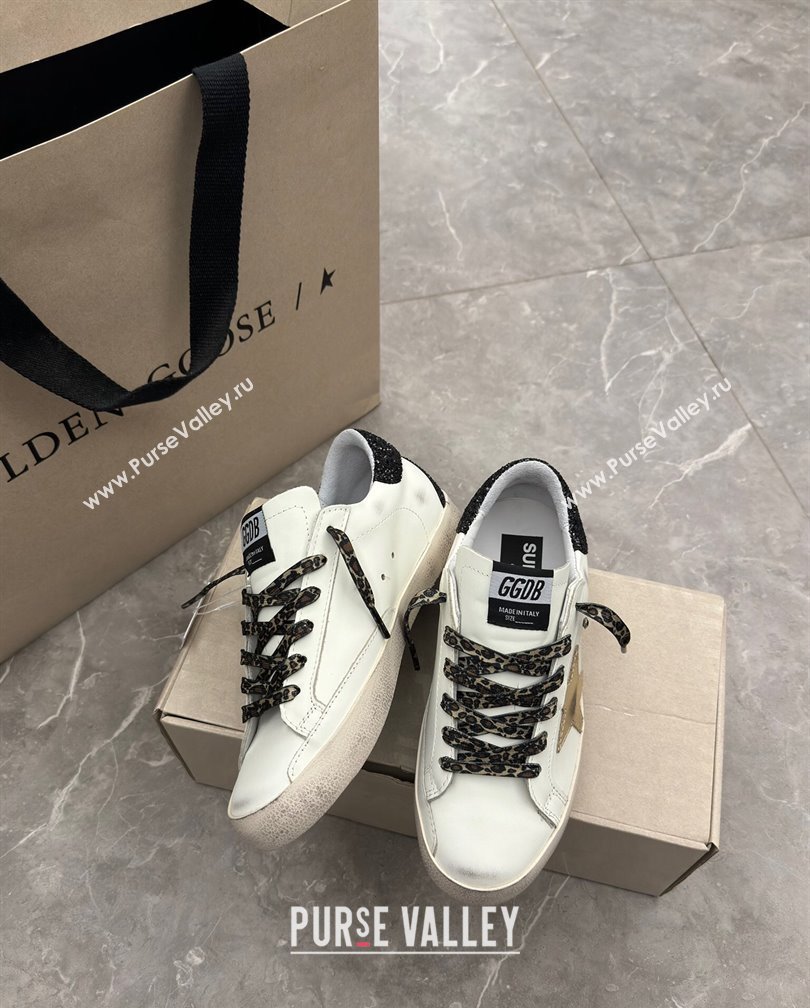 Golden Goose Super-Star Sneakers in white leather with black strass tab and gold star 2024 (13-241113003)